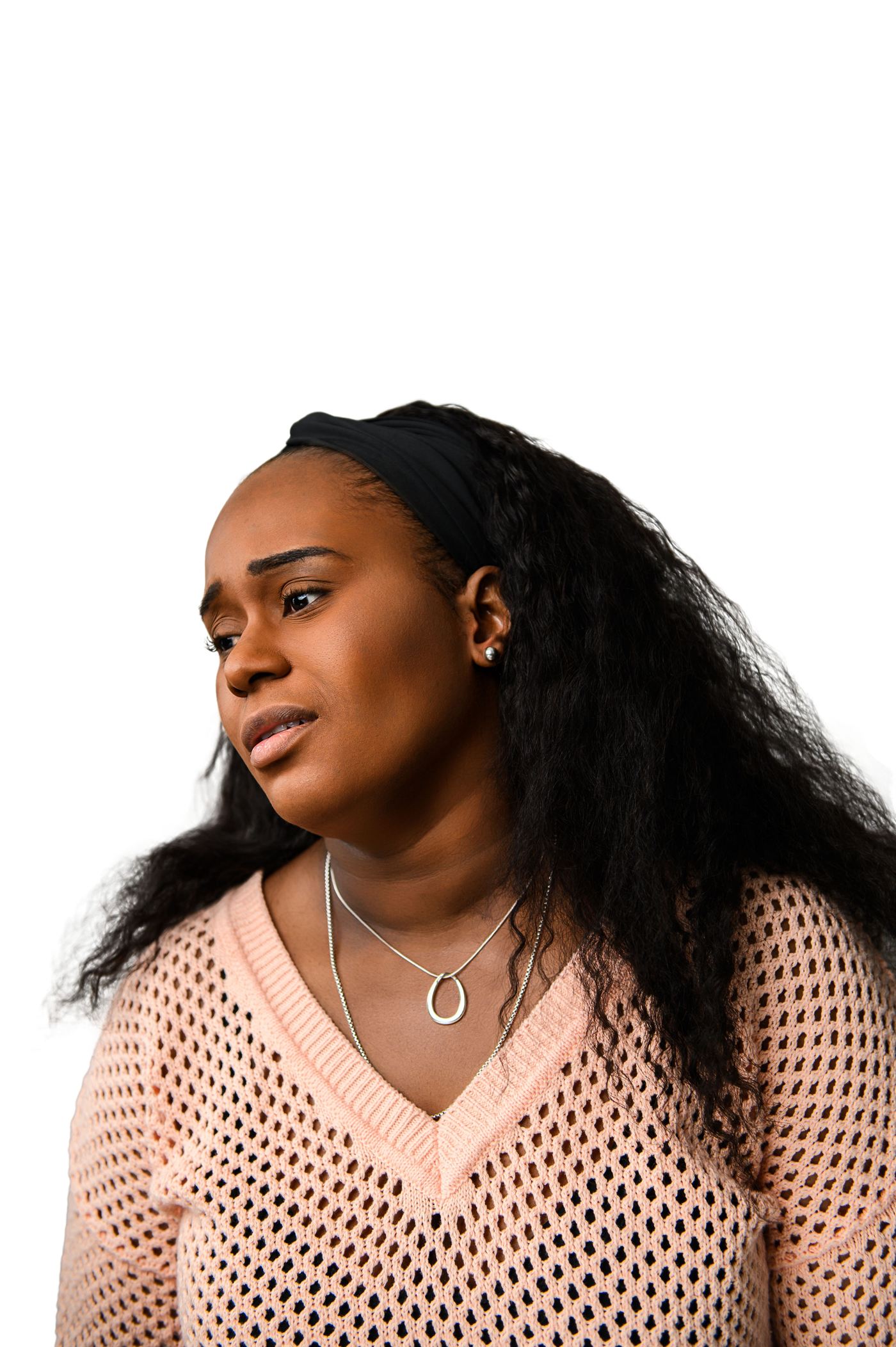 Shalanda Shaw looking to the side, against a white backdrop