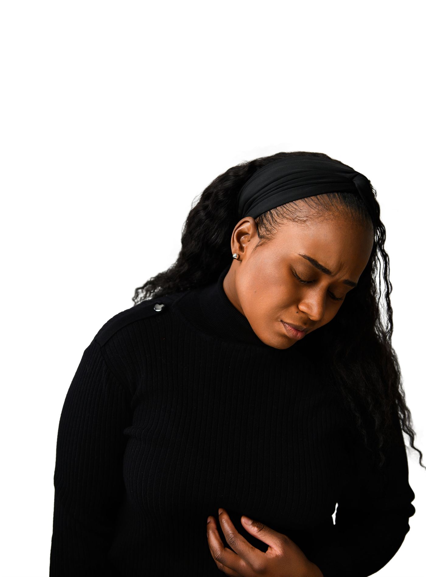 Shalanda Shaw, head bowed, against a white backdrop